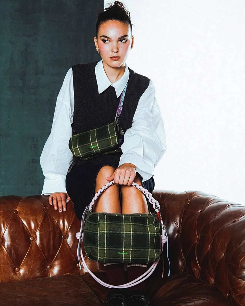 Topologie FW26. New shapes, bold checks, and seasonal pops of color.